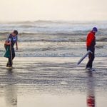 clam diggers on beach