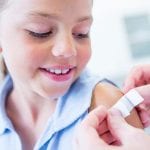 Kaiser Permanente Flu Season Child with Bandaid